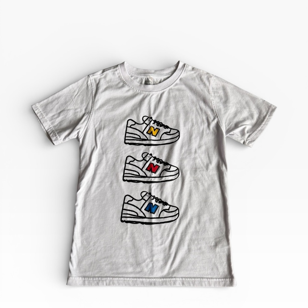 New Balance White Tee with Colorful Sneaker Graphics